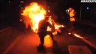 Italian Protester Sets Himself Alight ..... ALSO Sets Cops on Fire !