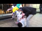 Asian boy dressed as a rabbit gets tickled