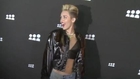 Miley Cyrus Grabs Crotch, Flashes Under Boob